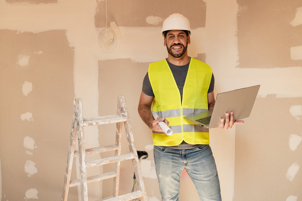 Property manager reviewing building plans